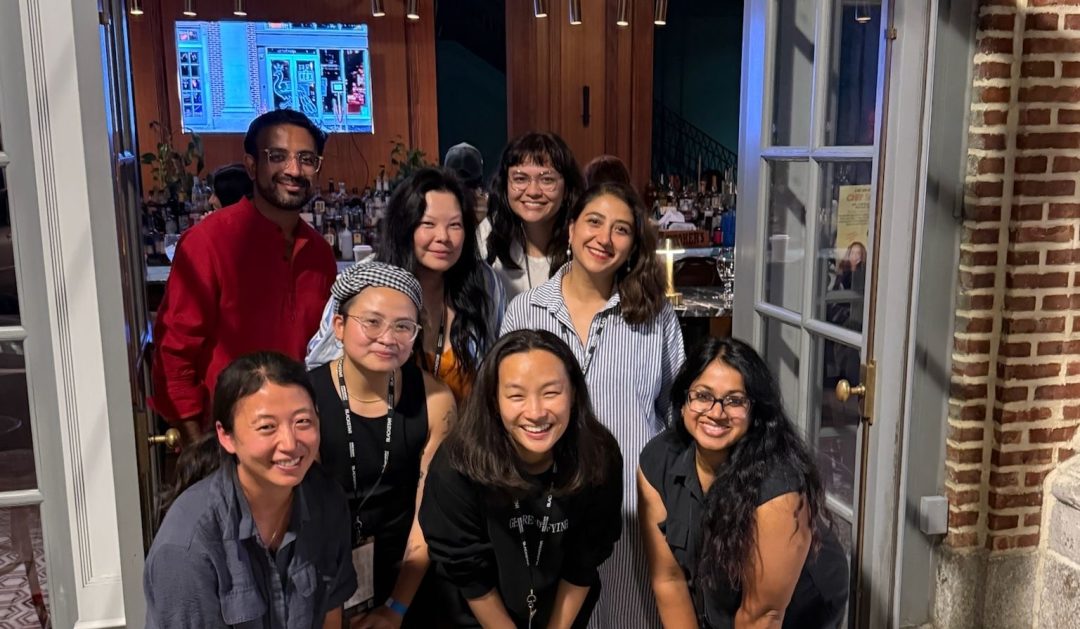 A group of AAPI filmmakers pose for a photo